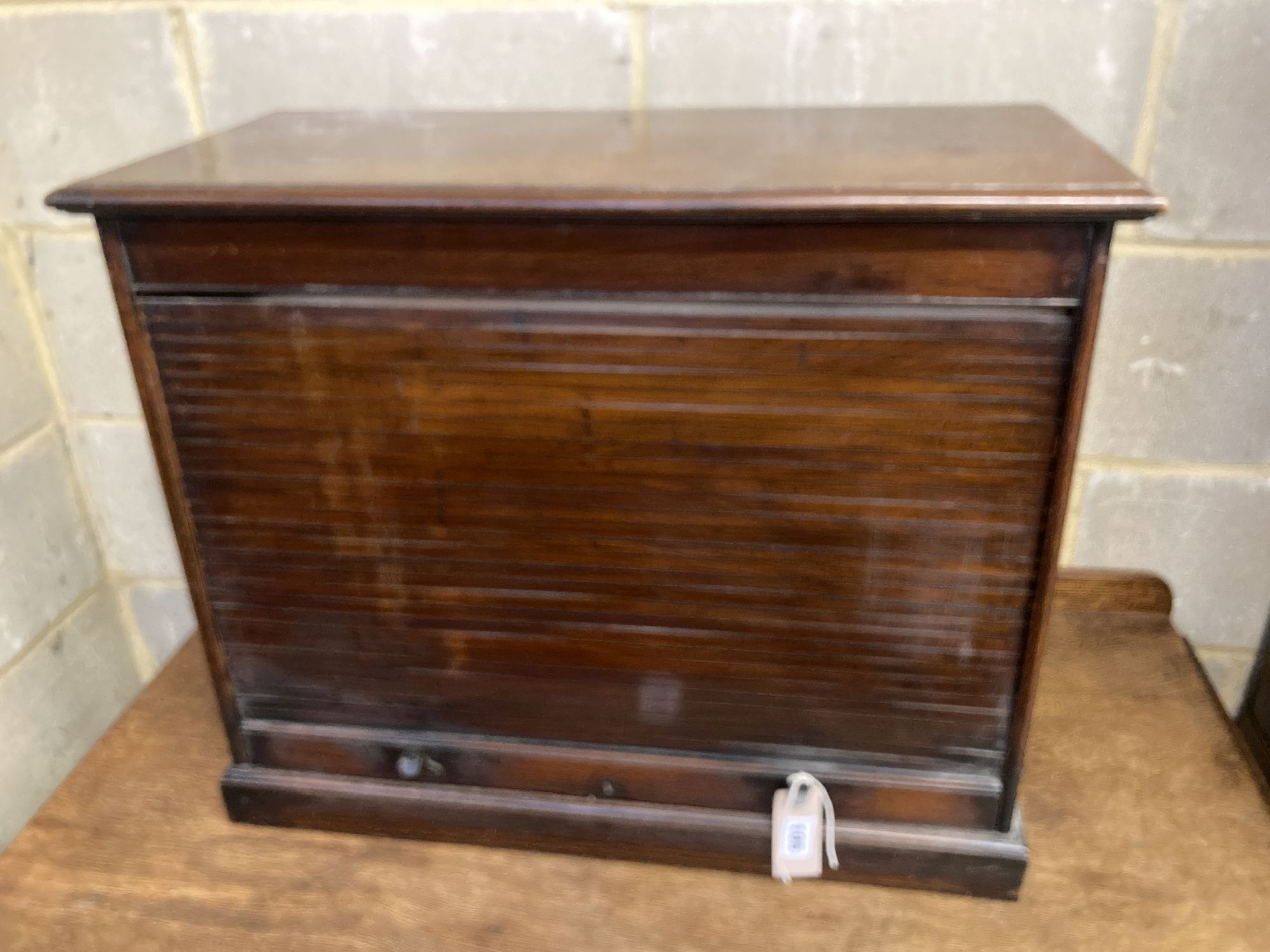 An early 20th century mahogany tambour table top office cabinet, width 68cm, depth 31cm, height 56cm